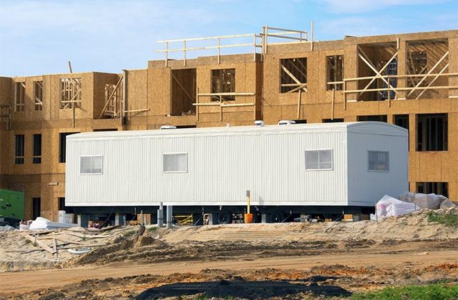 crane lifting modular building for construction office rentals in Bradbury CA